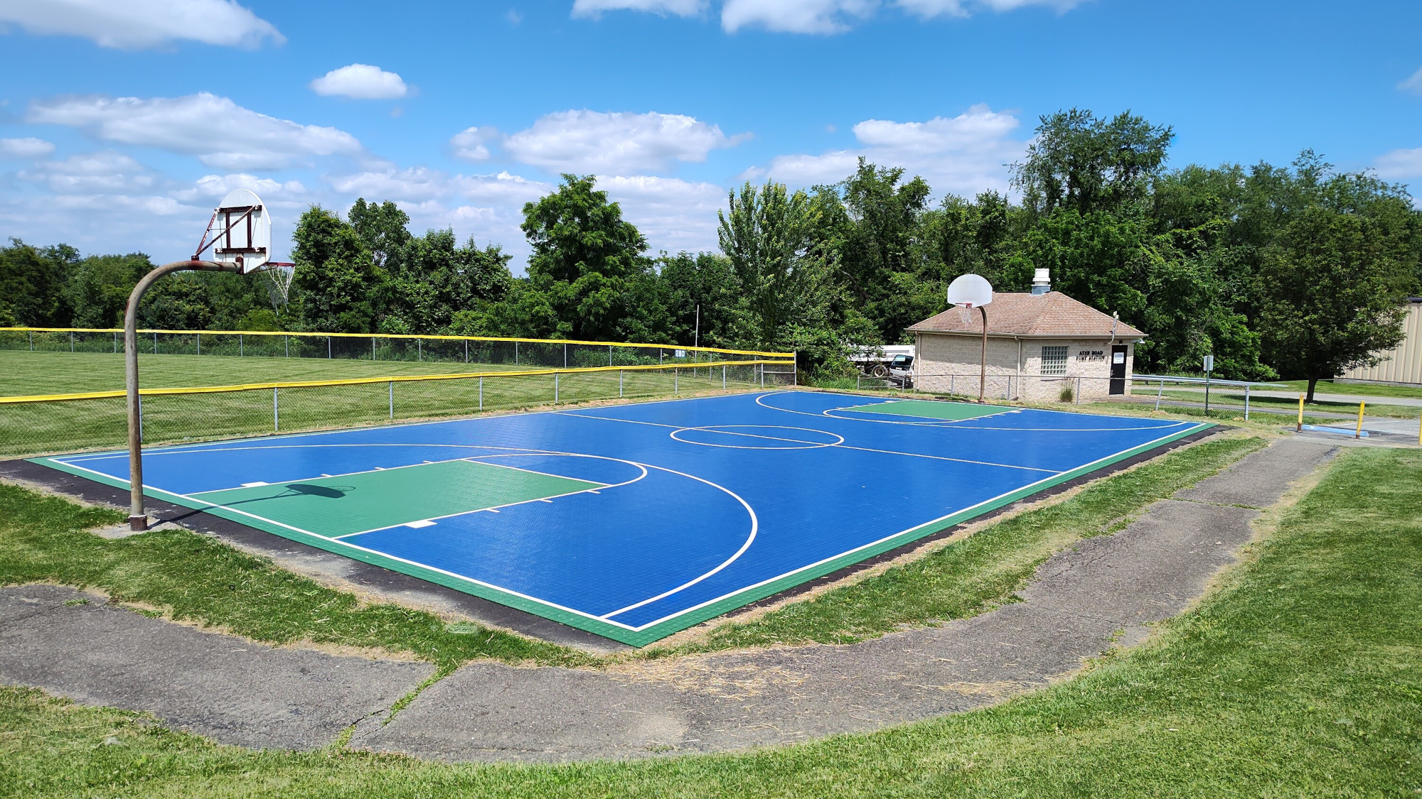 Navy Blue and Sport Green Full Court Basketball HomeCourt in Public Park